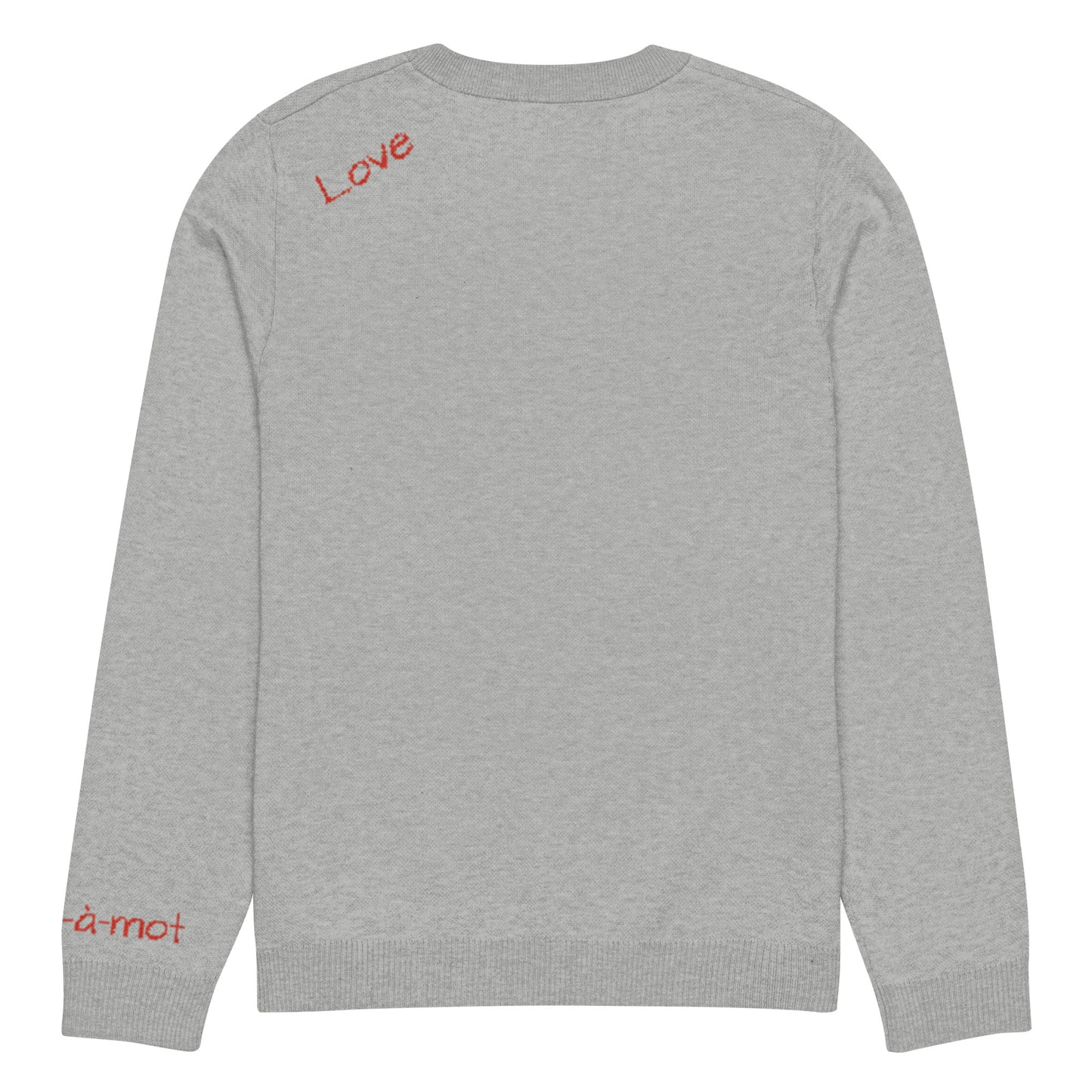 Back view of a grey knitted jumper with a ribbed neckline and cuffs, featuring the word "Love" embroidered in red cursive script on the upper back. A small brand tag "mot-à-mot" is visible on the lower left sleeve