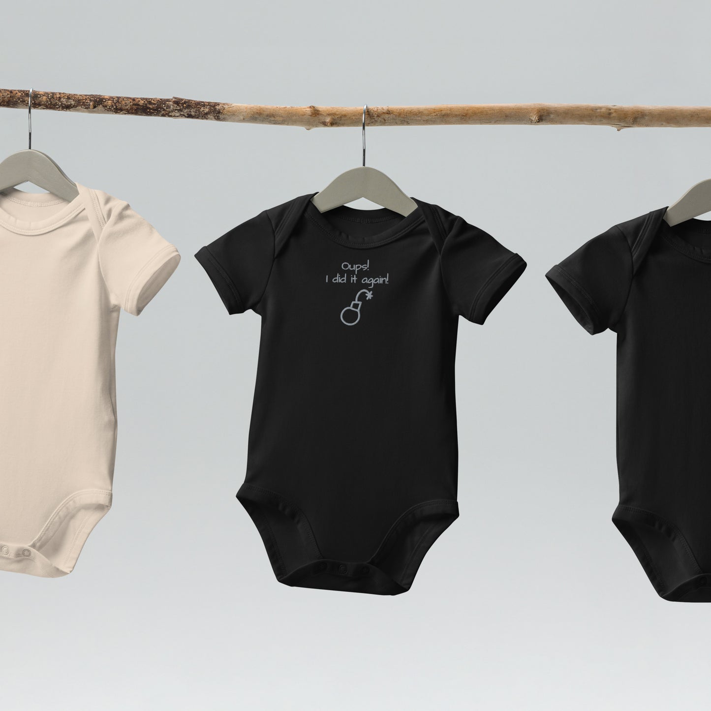 NEO [OUPS! I did it again] Embroidered organic cotton baby bodysuit