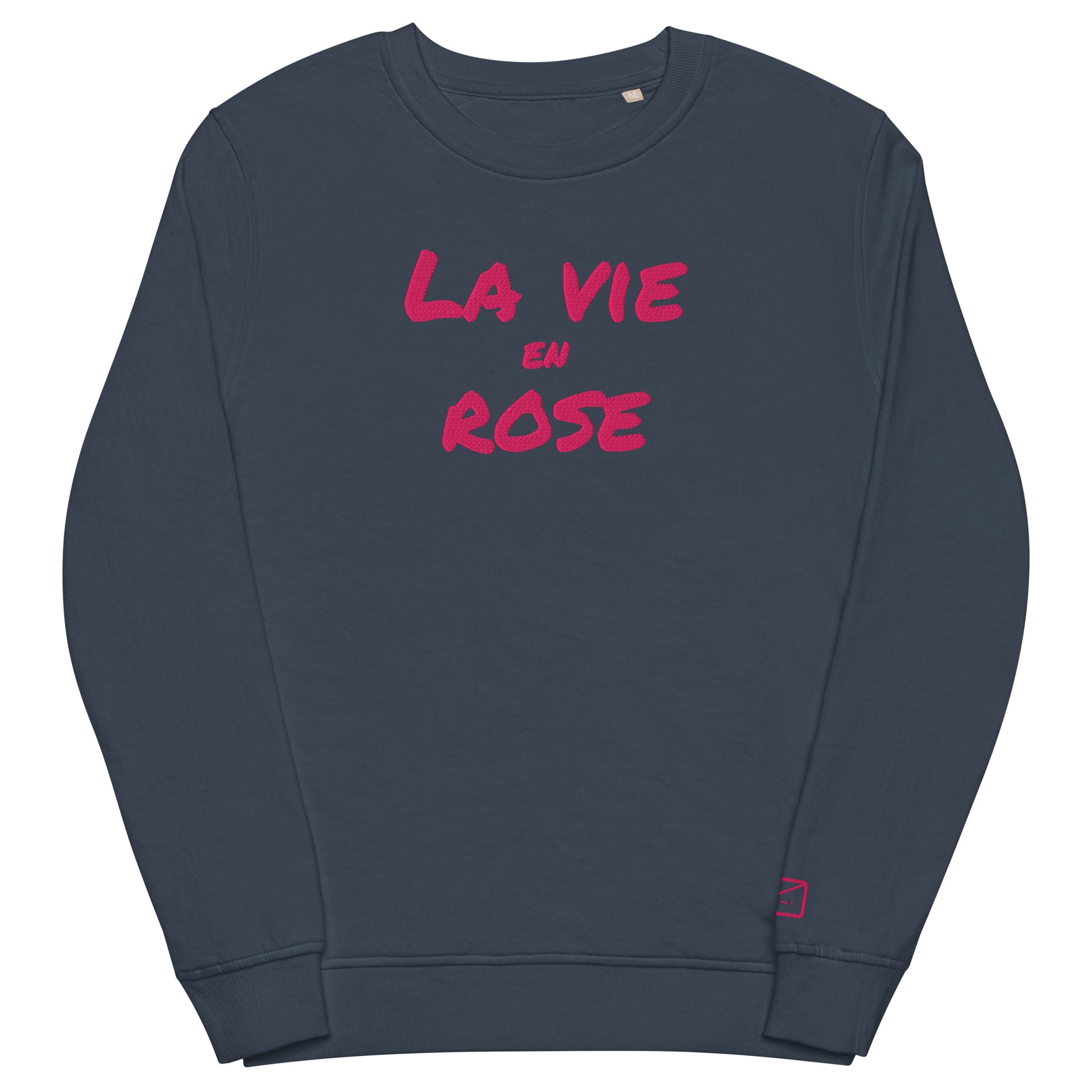Dark blue sweatshirt with the French phrase "La Vie en Rose" (Life in Pink) embroidered in pink lettering.