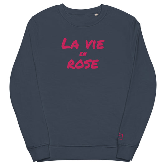 Dark blue sweatshirt with the French phrase "La Vie en Rose" (Life in Pink) embroidered in pink lettering.