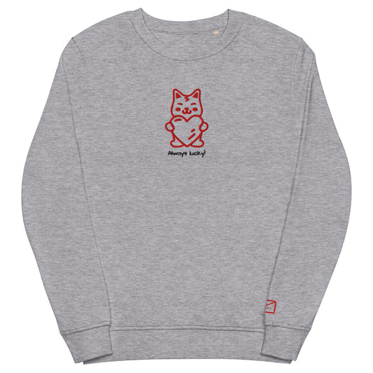 Grey crew neck sweatshirt featuring a red embroidered illustration of a stylized cat holding a red heart, with the embroidered phrase "Always lucky!" in red lettering beneath.