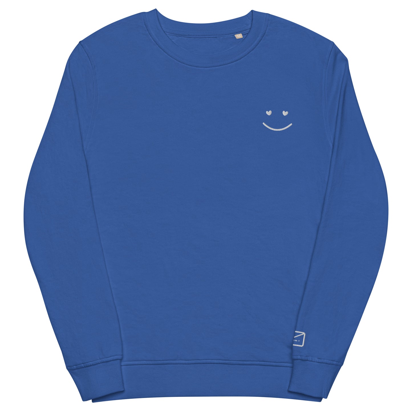 Royal blue crew neck sweatshirt featuring a small, delicate white embroidered smiley face on the left side of the chest